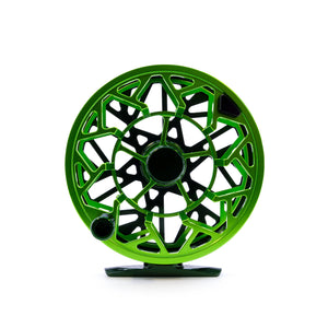 Green fly-fishing reel with an open-frame design displayed against a white background.