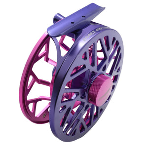 Purple and pink Cheeky Burst 325 fly fishing reel at an angle