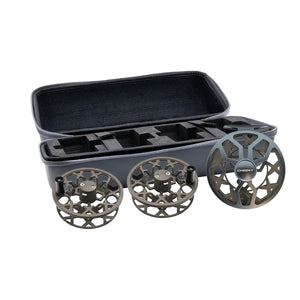 Two tiptide fly fishing spools and one drip fly reel displayed in front of an open gray and black protective case as the drip triple play on a white background