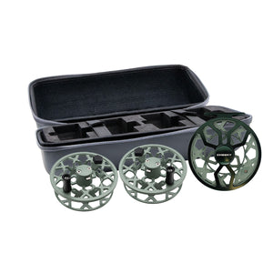 cheeky drip fly fishing reel with two spools shown alongside an open black protective storage case as the Drip Triple Play