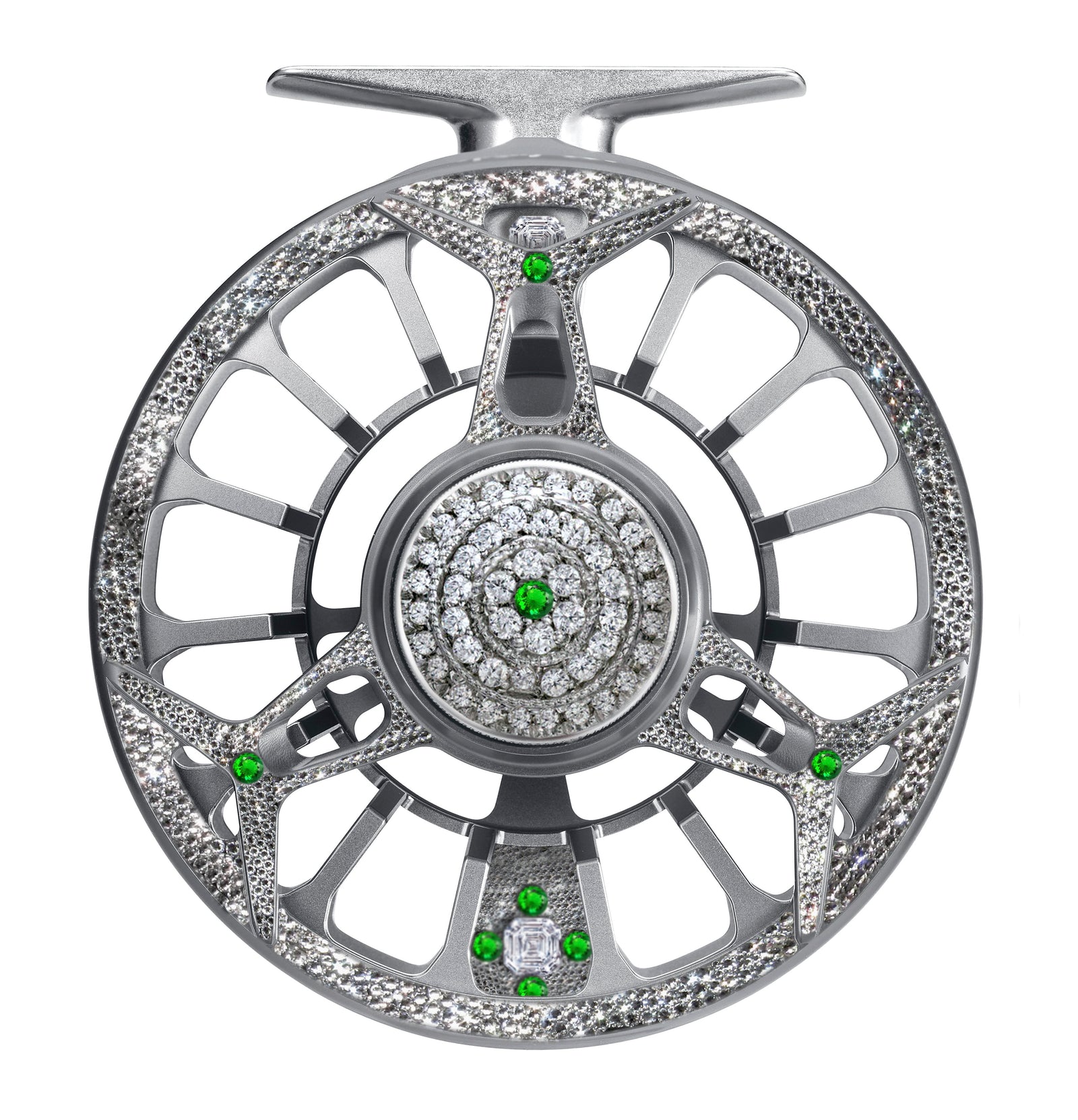 Silver Diamond Drift fly reel embellished with diamonds and green gemstones in a symmetrical, luxury design.
