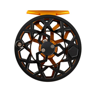 Yellow and black drip fly reel on white background spool side